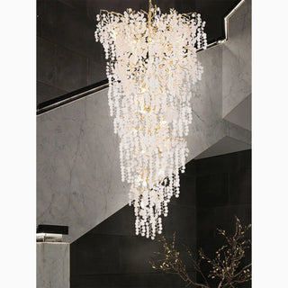 MIRODEMI Aidone large gold crystal chandelier with a long cascading drop in a double-height space