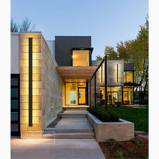 Albizzate outdoor waterproof LED wall lamp mounted on a modern building facade