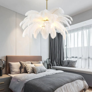 Gembloux white feather chandelier hanging in a bedroom