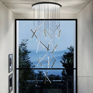 MIRODEMI Villars-sur-Var long multi-head pendant light in gold hanging over a kitchen island