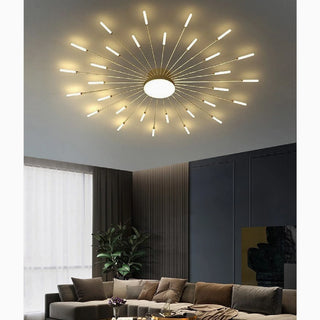 Willisau sunburst LED ceiling light with radiating rays above a living room sofa