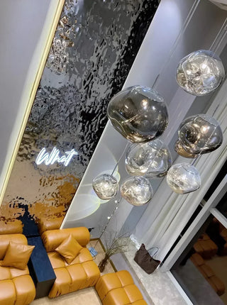 Modern LED bubble staircase chandelier with cascading illuminated spheres, designed for ambient and decorative lighting in contemporary interior spaces