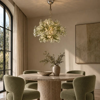 Fiorvella Ruffled Glass Chandelier hanging above a round dining table
