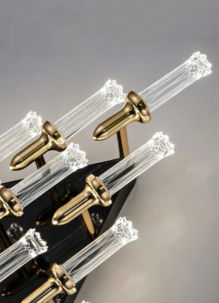 Modern gold wall sconce with candle-shaped bulb holder
