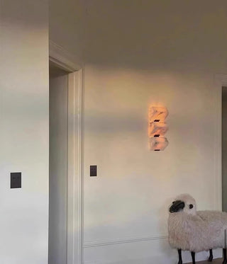LED wall sconce crafted from genuine marble stone