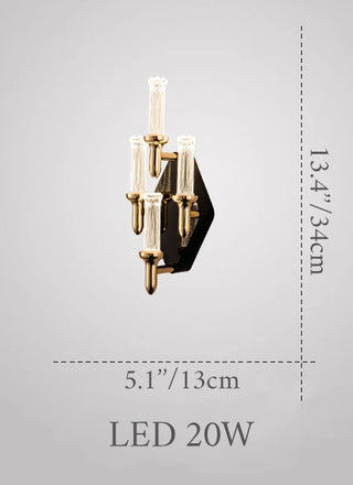 Compact gold wall sconce with a candle-shaped design