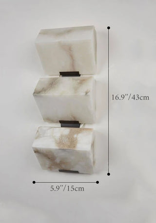 Marble and copper LED wall sconce with warm inviting glow