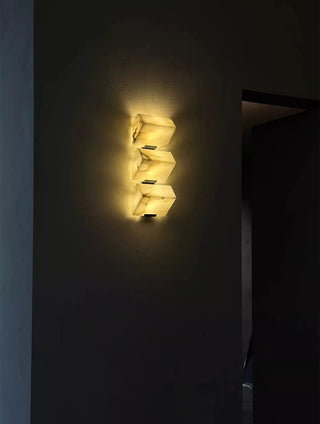Marble stone wall sconce with integrated LED source
