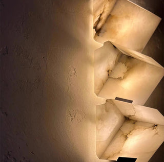 Copper and marble LED wall light for modern interiors