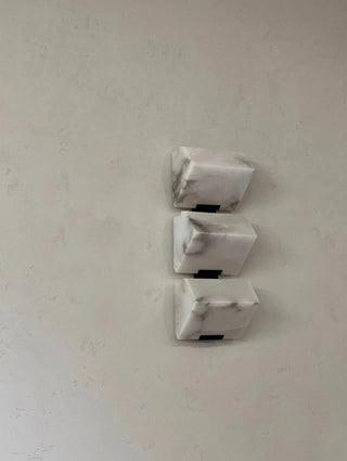 Marble wall lamp with wedge LED light source
