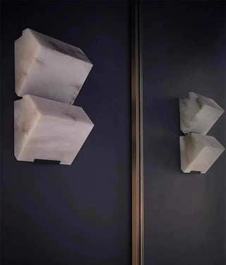 Modern LED wall sconce in natural marble finish