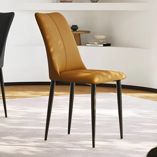 Brown chair with black legs in a room setting