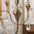 Imperial Crystal Chandelier brass arm detail with faceted crystal accent