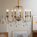 Imperial Crystal Chandelier glowing with warm candle-style lighting
