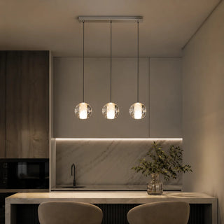 Lenno crystal bubble-glass globe pendant lights in a three-light linear row over a kitchen counter