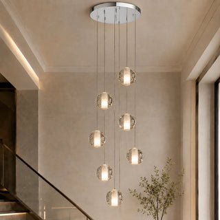 Seven-light Lenno crystal bubble-glass globe chandelier in a tall two-story stairwell