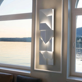Minimalistic modern white wall sconce