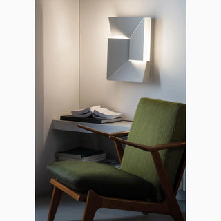 White geometric wall lamp with clean angular lines