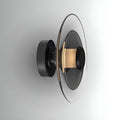 Modern smoked glass disc wall light with matte black base and integrated LED