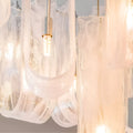Detailed close-up of frosted textured glass lampshade with visible LED filament bulb inside