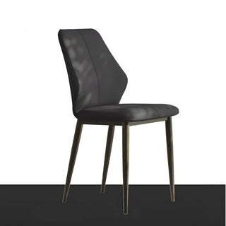 Side profile of the black minimalist accent chair, showing sleek contours and metal legs