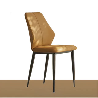 Side view of the caramel-colored minimalist accent chair with curved backrest and black legs