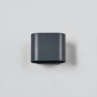 Front view of Aeris LED wall light with sleek curved black finish