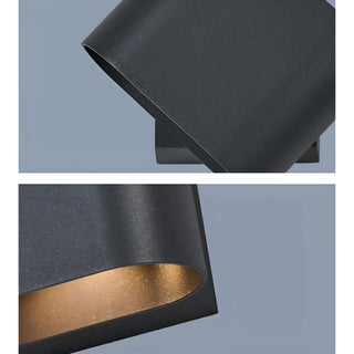 Close-up view of Aeris wall sconce showcasing premium black aluminum texture