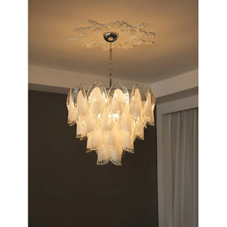 Altavilla Murano Glass Chandelier illuminating modern dining room interior with warm ambient light
