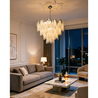 Illuminated Altavilla Murano Glass Chandelier creating warm evening ambience in living room