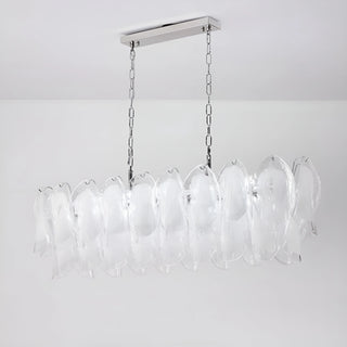 Modern chandelier with clear glass shades on a white background