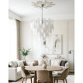 Altavilla Murano Glass Chandelier above modern dining table in neutral interior