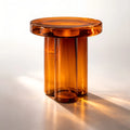 Modern amber glass side table with thick circular top and column base