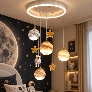 Astrielle glowing planet chandelier in a space-themed kids room