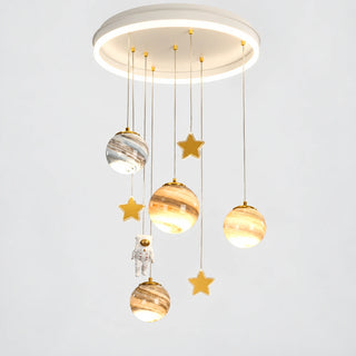 Astrielle planet and astronaut LED chandelier on a neutral background