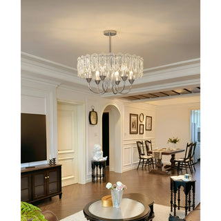 Large Aurem chrome chandelier in elegant living room interior with warm ambient lighting