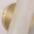 Aurora alabaster wall sconce with brushed brass wall mount detail