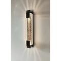 Sleek black metal and crystal LED wall light with warm white lighting effect