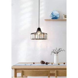 Modern black crystal pendant lamp in a light minimalist dining room interior