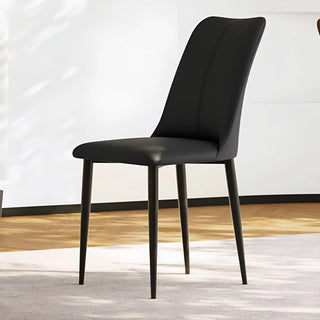 Sleek black dining chair with faux leather upholstery, curved back, and slim metal legs