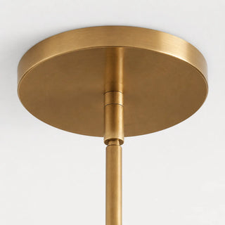 Detail of the burnished brass ceiling canopy and stem of the Bollara cluster chandelier