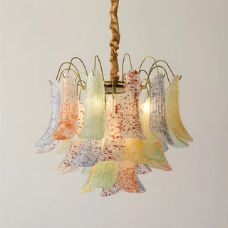 Illuminated Calyra Murano glass chandelier with colorful textured glass and warm ambient lighting
