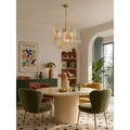 Luxury dining room featuring the Calyra multicolor Murano glass chandelier with colorful handcrafted art glass