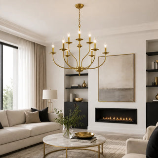 Gold Candelara candle chandelier in a warm living room with a fireplace and beige sofa
