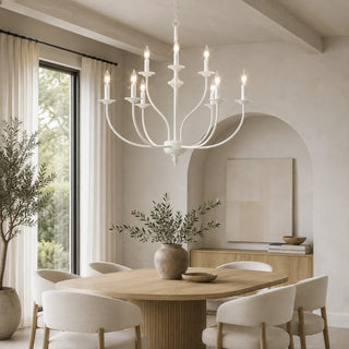 White Candelara French country chandelier above an oval wood table in a soft neutral dining room