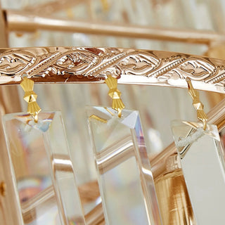 Close-up of Cap d'Ail chandelier ornate gold frame and crystal pendant connectors