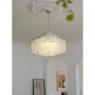 Close-up of decorative capiz shell chandelier with chrome frame in stylish contemporary interior