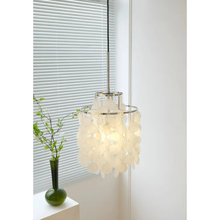 Side view of a capiz shell chandelier displaying hanging circular shells and chain details