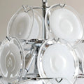 Close-up of the chrome frame and glass disk attachments on the Cassia chandelier