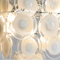 Close-up detail of the cream glass disks on the Cassia cluster chandelier